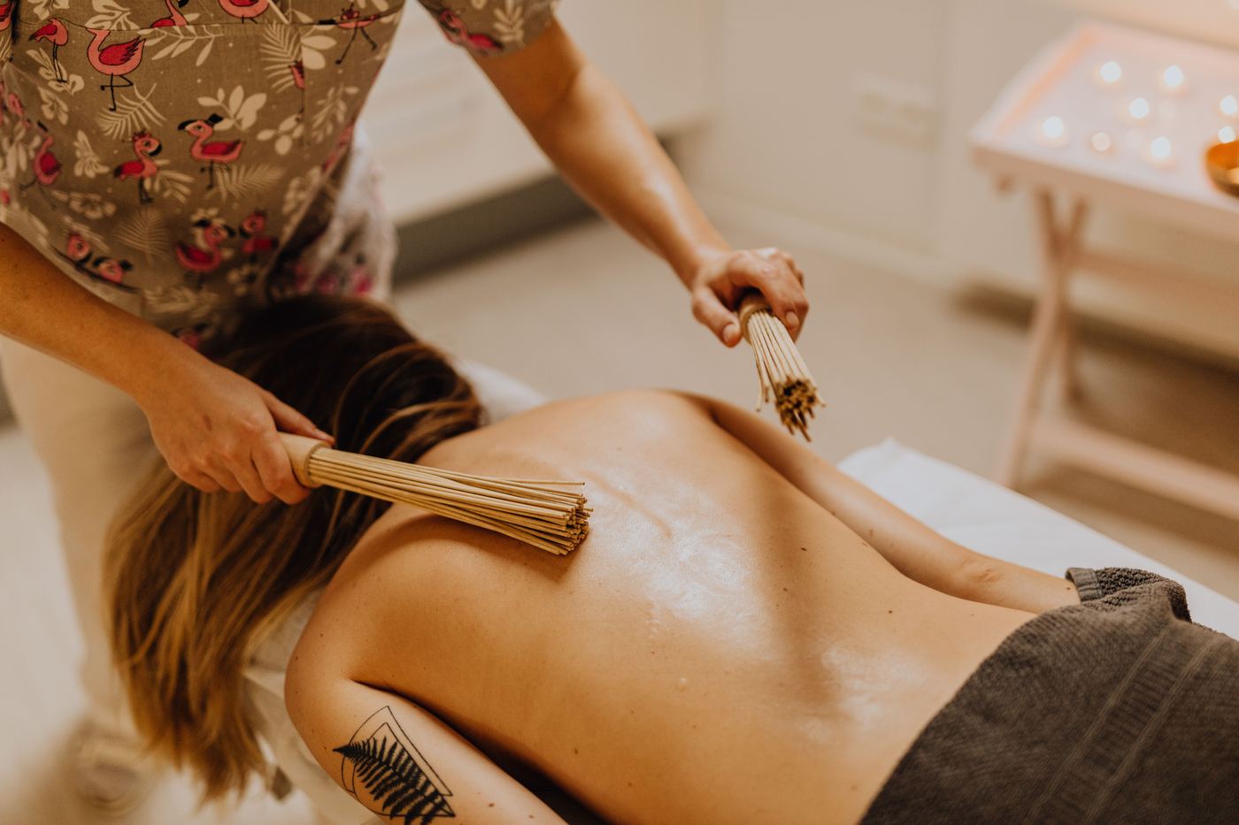 Therapist applying pressure during a massage treatment